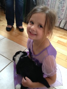 Our daughter with one of the puppies.